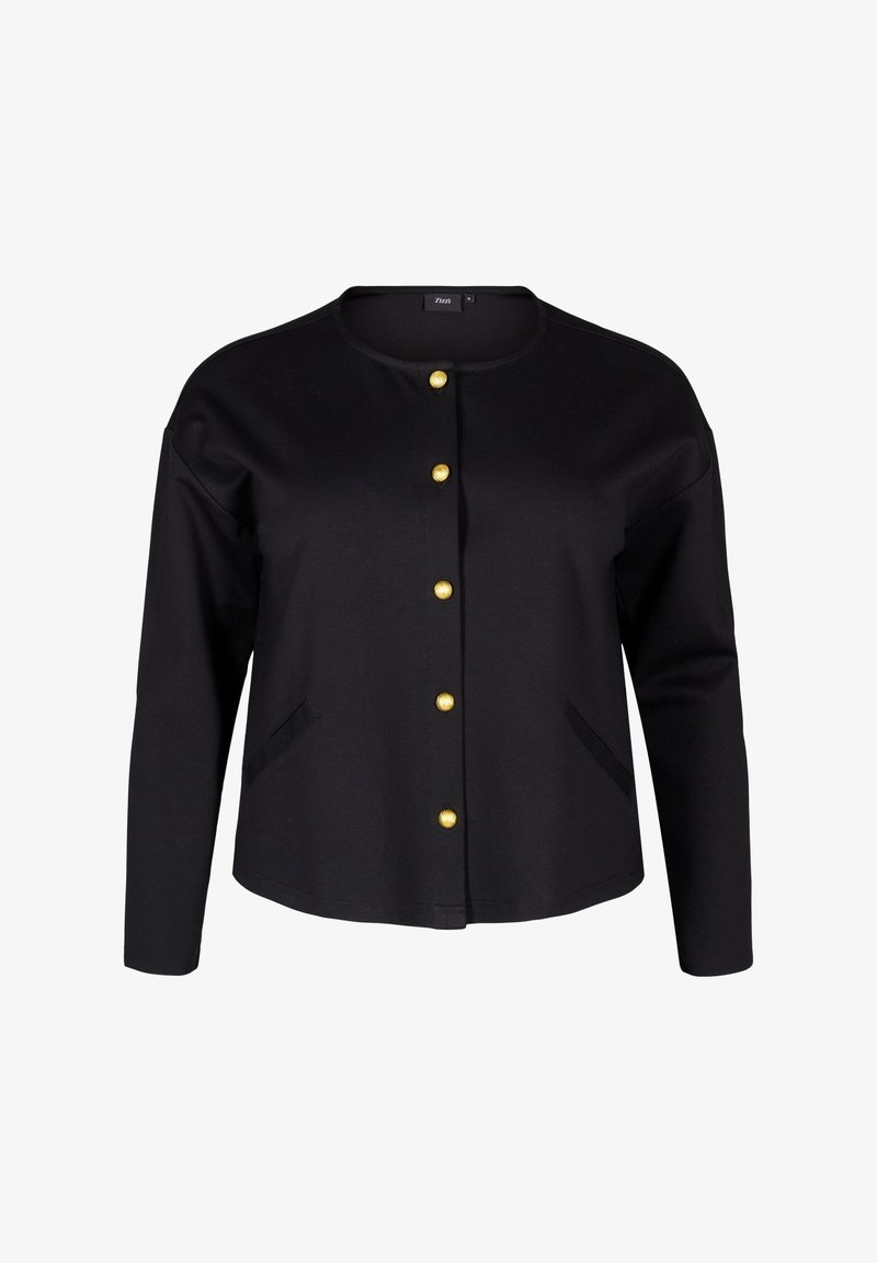 Črn kardigan iz mehkega blaga, z okroglo ovratnico, zlatimi gumbi in dvema stranskima žepoma. Preprost, neokrašen dizajn.