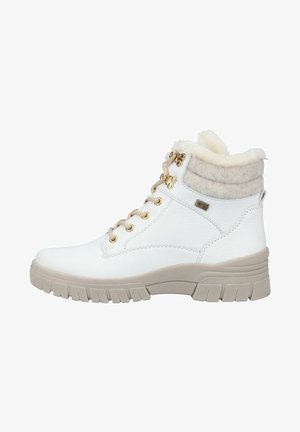 Botte d'hiver en cuir blanc avec semelle en caoutchouc beige, lacets beiges, œillets dorés et col rembourré en laine pour l'isolation.