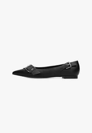 Black leather ballet flats with a pointed toe, featuring a decorative buckle and strap detail on the upper side. Flat heel design.