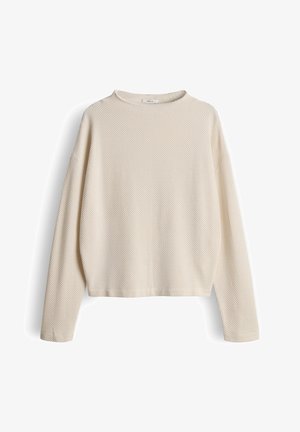 Crèmekleurige trui met lange mouwen, een gestructureerd honingraatpatroon en een ronde hals, met ontspannen, afhangende schouders.