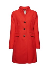 Rode wollen jas met een hoge kraag, drie grote knopen, twee zijzakken en een geweven stofafwerking. Klassiek ontwerp tot op de knie.