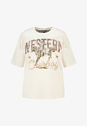 Chemise crème à manches courtes avec franges sur les épaules, présentant un texte usé "Western Cowboy" et un graphisme d'un cowboy chevauchant un cheval.