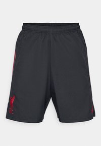 Shorts de sport noirs avec un waistband élastique, ornés du logo rouge de Liverpool FC et de bandes sur les côtés. Tissu léger et lisse, coupe droite.
