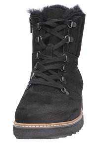 Botte de cheville en suède noir avec doublure en fausse fourrure, lacets à l'avant et semelle en caoutchouc. Comprend des œillets en métal et un col rembourré.