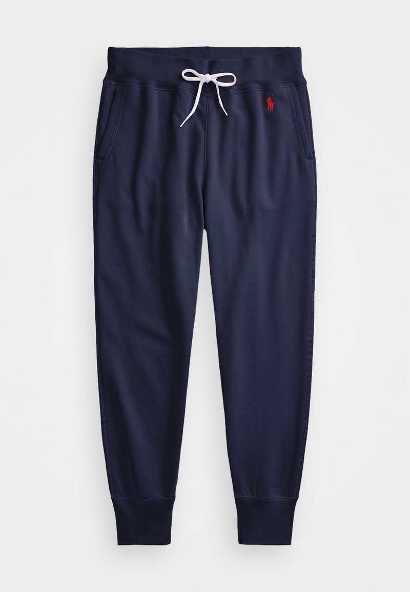 Navy jogger pants with elastic waistband and white drawstring. Features two side pockets and a small red logo on the left thigh. Smooth fabric texture.