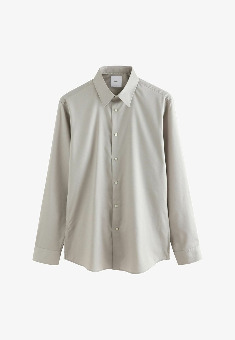 Camicetta grigia chiara a maniche lunghe realizzata in tessuto morbido. Presenta un colletto a punta, chiusura con bottoni e orlo arrotondato. Design minimalista con una texture sottile.