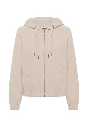 Veste à capuche beige clair avec une fermeture éclair à l'avant, des poignets et un ourlet élastiques ; comprend deux poches latérales et des cordons pour régler la capuche.