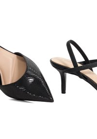 Black high-heeled shoes featuring a pointed toe and textured snakeskin pattern, alongside strappy sandals with a sleek design and moderate heel.
