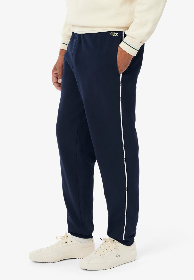Lacoste Sport - PANT TAPE - Pantalon de survêtement - navy blue, Agrandir