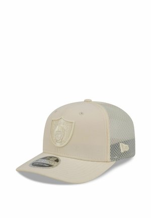 Beige baseball cap with mesh back, front embroidered Raiders logo, curved brim, and a sticker on the brim.