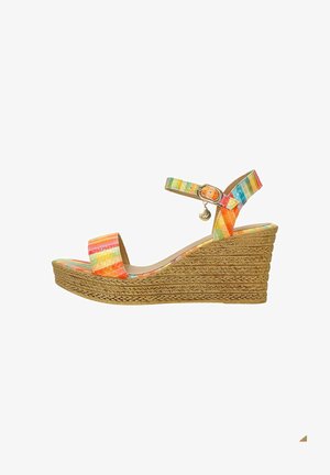 Colorful wedge sandal with a woven jute sole. Features adjustable strap with a metallic buckle, textured multicolored upper, and open toe design.