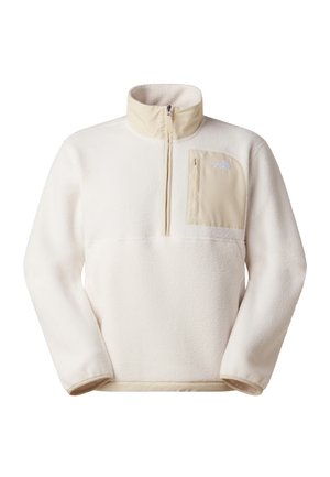 Fleecový pulovr v světle krémové barvě s půlzipem na krku, přední kapsou v béžové barvě a měkkou texturou. Na hrudi je logo.