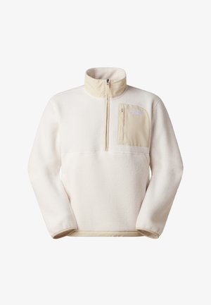 Fleecový pulovr v světle krémové barvě s půlzipem na krku, přední kapsou v béžové barvě a měkkou texturou. Na hrudi je logo.