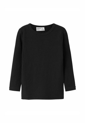 Sort langærmet ripstrikket bluse til børn med rund halsudskæring, enkelt design med en lille tøjmærkat inde i halsudskæringen.