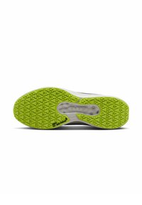 Suola della scarpa con una superficie in gomma verde testurizzata, caratterizzata da un motivo geometrico e un'unità di ammortizzazione visibile nella suola intermedia.