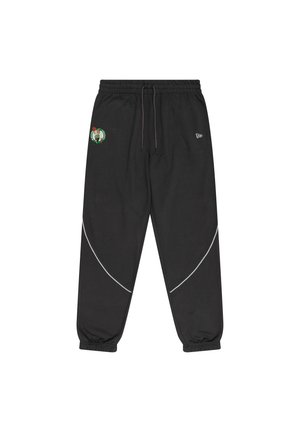 Pantalons de survêtement noirs en tissu doux, avec une taille élastique à cordon de serrage, des pipings latéraux et un logo brodé.