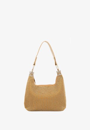 Sac à main doré recouvert de petits clous ronds avec une seule poignée et une quincaillerie en ton argent près des attaches de la sangle.