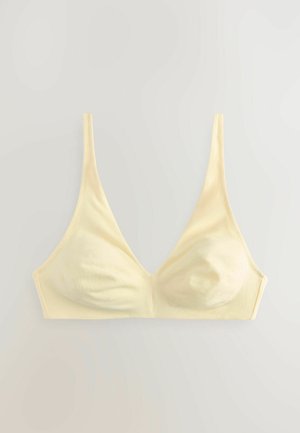 Kollane pehme kangast bralette, millel on sügav V-kaelus, õhukesed rihmad ja sile tekstuur, ilma igasuguste kinnituste või kaunistusteta.