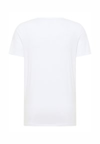 Tricou alb cu mânecă scurtă și guler rotund. Fabricat din bumbac moale, cu o textură netedă și un design simplu, clasic.