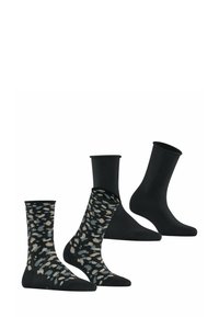 Trois paires de chaussettes : une avec une base noire et un motif de taches colorées, deux entièrement noires, de hauteurs variées et avec une texture douce.