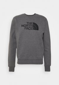 Grauer Pullover mit rundem Ausschnitt, auf der Vorderseite mit einem schwarzen, aufgedruckten Logo "THE NORTH FACE" und einem Bogen-Design.