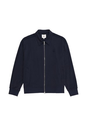 Marineblaue Jacke mit Reißverschluss, dünnen weißen vertikalen Streifen, spitzem Kragen, zwei Vorderentaschen und gerippten Bündchen und Saum.