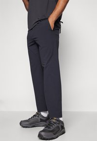 Peak Performance STRETCH DRAWSTRING PANT - Hlače za na prostem - black