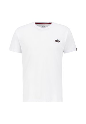 T-shirt en coton blanc à manches courtes avec un petit graphique d'étoile noire et rouge sur la poitrine gauche et un col intérieur rouge contrastant.
