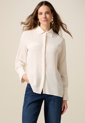 Paitapusero - bianco