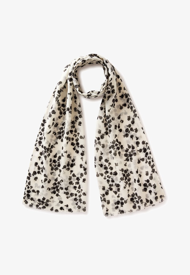 Sciarpa bianca leggera con macchie floreali nere irregolari, avvolta morbida nella parte superiore su sfondo bianco.
