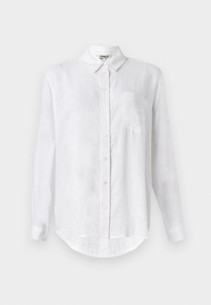 Balta ilga rankovė marška, pagaminta iš lininio audinio, su mygtukų apykakle, viena krūtinės kišenė ir apvaliais kraštais. Turi standartinę priekinę mygtukų uždarymo sistemą.