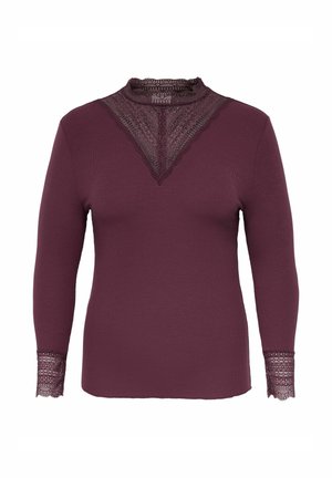 Top a maniche lunghe color prugna con dettagli in pizzo sul collo alto, inserto sul petto e polsini delle maniche, realizzato in tessuto a coste.