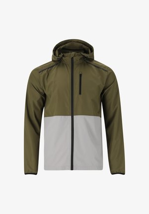 Huppari, jossa on vihreä yläosa ja harmaa alaosa, valmistettu sileästä, kevyestä materiaalista, jossa on etuvetoketju ja sivutaskut.