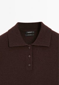 Dark brown cashmere polo shirt with three buttons and a pointed collar, featuring Massimo Dutti brand label inside collar.
