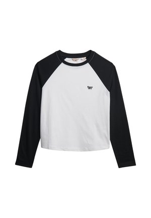 Langærmet skjorte med hvidt kropsmateriale og sorte raglanærmer, med et sort logo på brystet og rund halsudskæring. Fremstillet af bomuldsstof.