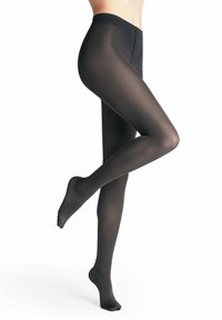 Schwarze, transparente Strumpfhosen mit glatter Textur, fusselfreiem Design und elastischem Bund, auf einem Bein mit erhobenem Fuß präsentiert.