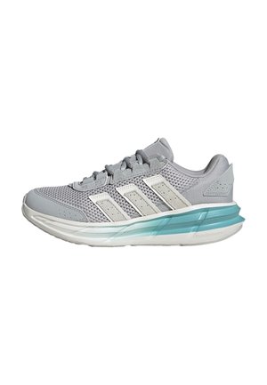 Light gray athletic shoe with mesh upper, white accents, and a teal-tinted sole. Features textured surface and a lace-up design.