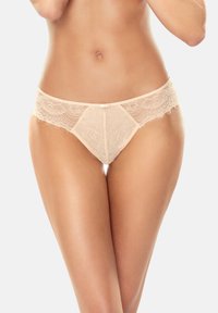 Damen-Schnürbikini-Slips in Nude-Farbe mit einem glatten Bund, floralen Spitzenmustern und einem kleinen Schleifenakzent in der Mitte vorne.
