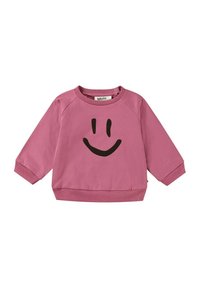 Felpa rosa con grafica di un sorriso nero. Caratterizzata da maniche raglan, scollatura rotonda e orlo e polsini a costine. Tessuto morbido.