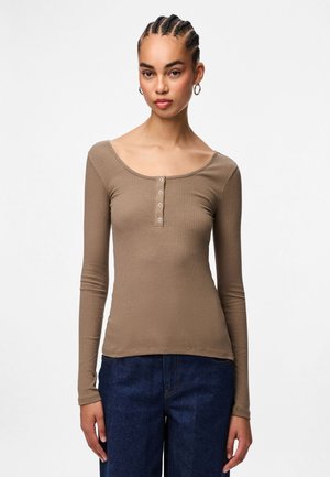 Brown ribbed long-sleeve top with a scoop neckline and five-button placket. Made from a stretchy fabric, it fits closely to the body.