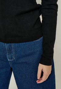 Minus Maglione - black
