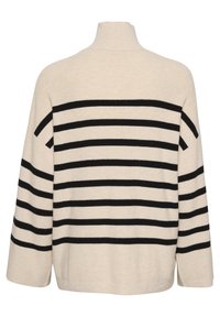 Krämfärgad polotröja med svarta horisontella ränder, ribbad textur och breda, hängande ärmar. Bakdelen visar samma randmönster.