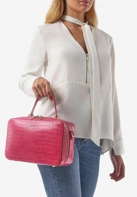 Miriade SOLANA - Borsa a mano - fuxia