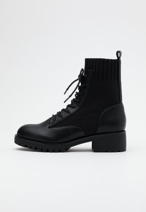 Lace-up ankle boots - black