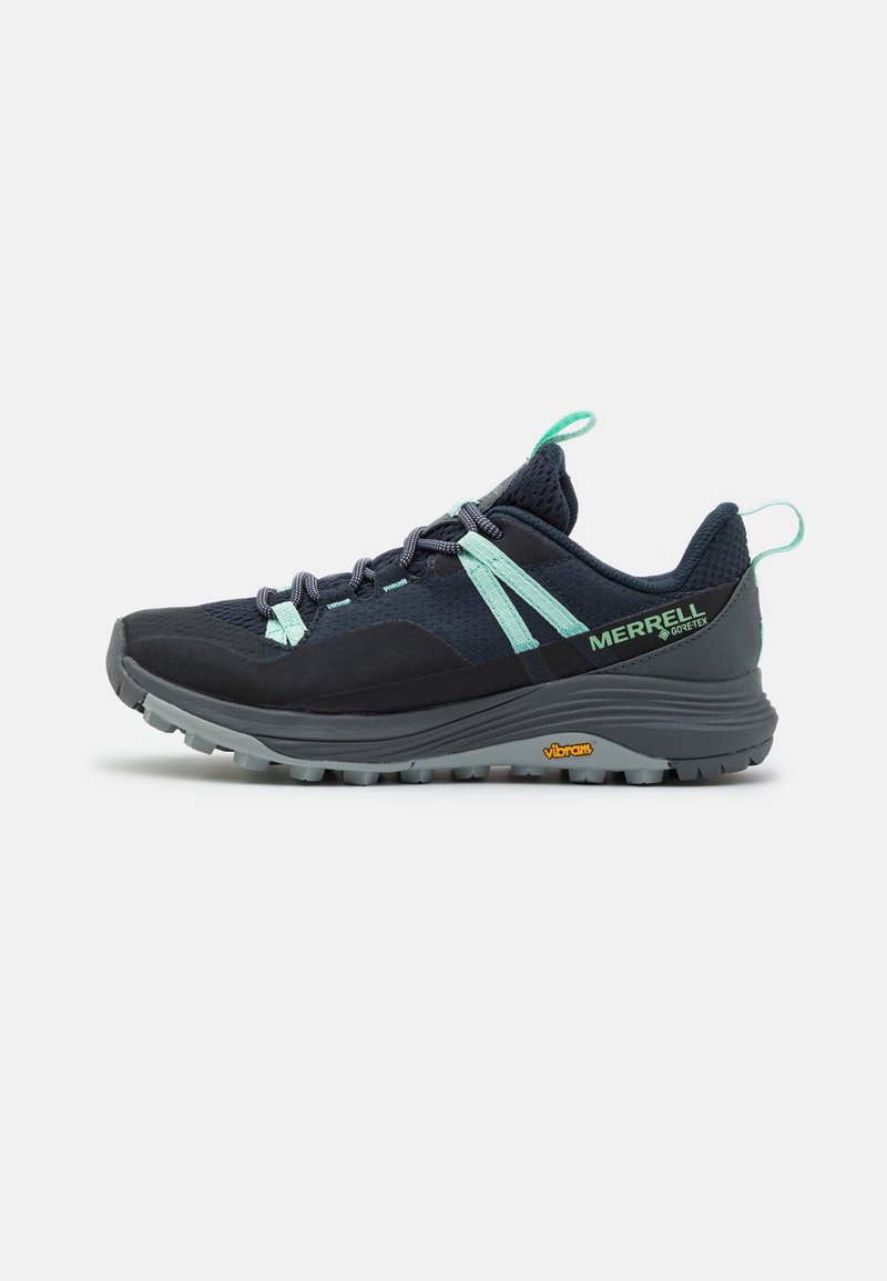 Chaussure de randonnée Merrell en noir et teal, dotée d'une tige en mesh, d'un embout renforcé, d'une semelle extérieure Vibram et d'un système de laçage sécurisé pour la stabilité.