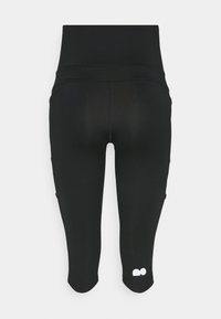 Black capri leggings with a high waistband, made from stretchy, smooth fabric. Features a small white logo on the lower left side.