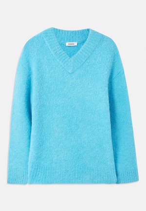 Stickad tröja - turquoise