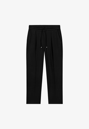 Black, loose-fitting trousers made of soft fabric. Features an elastic waistband with a drawstring, two side pockets, and subtle pleats.
