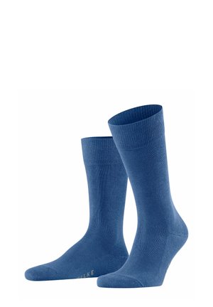 Blue cotton blend socks with a ribbed cuff, featuring a smooth texture, medium height, and a reinforced toe. Logo printed on the sole.