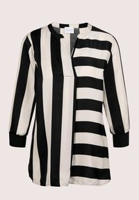 Zwart-wit gestreepte blouse van gladde stof. Heeft lange mouwen met elastische manchetten en een V-halsopening aan de voorkant.